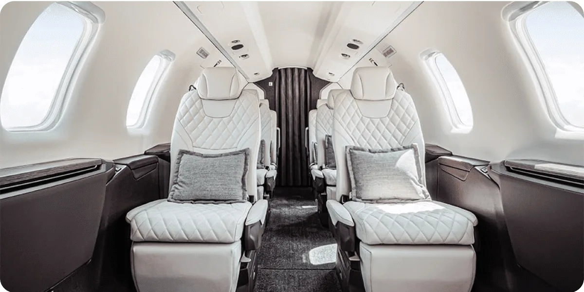 Premium private jet cabin with quilted seats