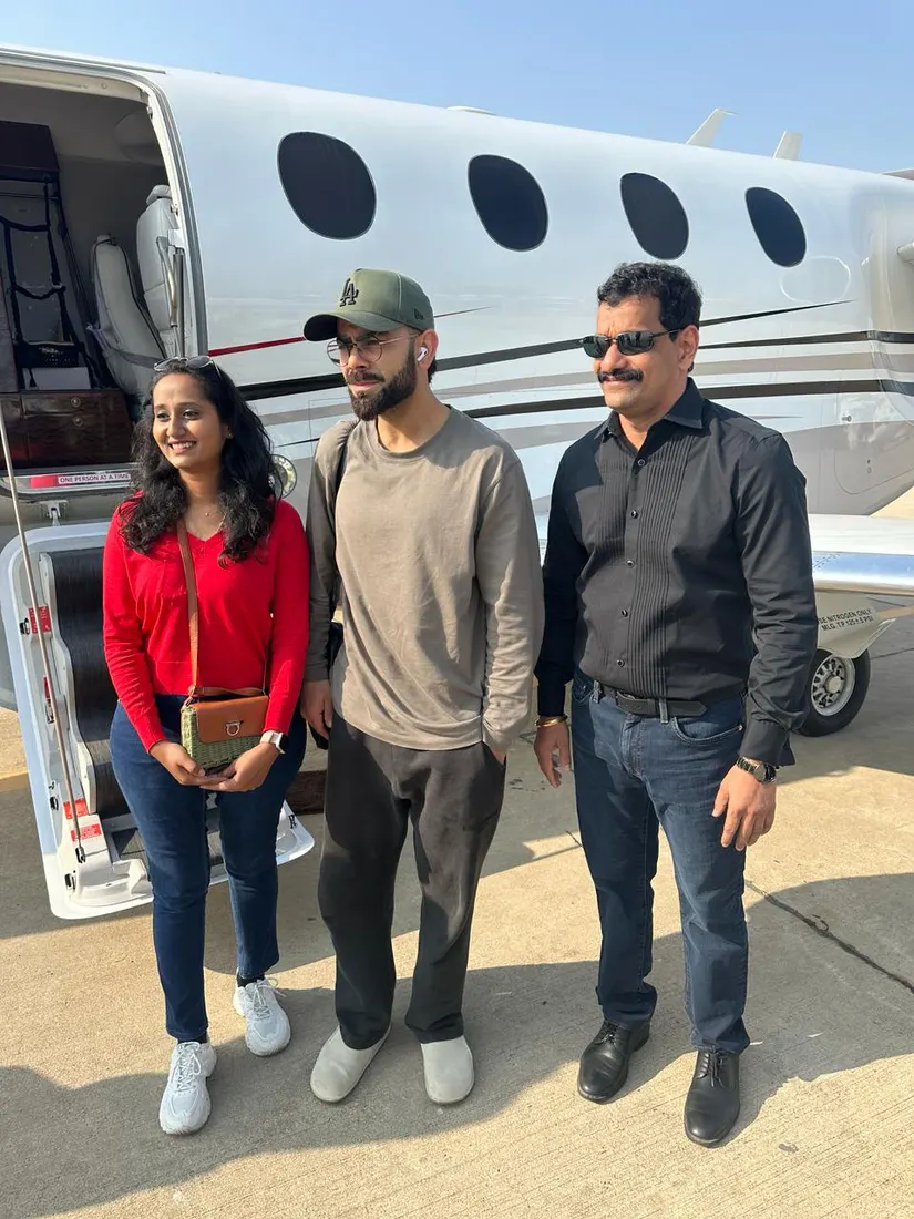 Halo Airways guests beside a private jet